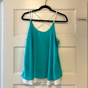 Turquoise and white tank